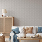 "Cozy living room with Wall Blush's Sand Dollar Wallpaper adding subtle elegance to the decor."