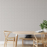 "Minimalistic dining room featuring Wall Blush's Sand Dollar Wallpaper, accentuating the space with elegance."