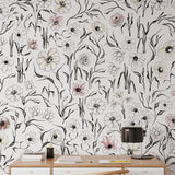 Scribe Wallpaper by Wall Blush SG02 in a stylish home office, with focus on floral wall decor.
