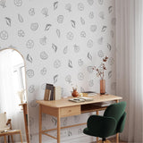 "Wall Blush Seashore Wallpaper in a modern home office, featuring creative seashell patterns for stylish decor."