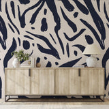 Stylish living room featuring Signe Wallpaper by Wall Blush SG02 with modern abstract design.
