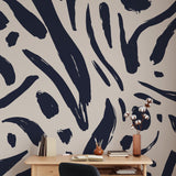 Modern home office with Wall Blush SG02 Signe Wallpaper featuring abstract navy brush strokes.
