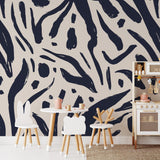 Children's room decorated with Signe Wallpaper by Wall Blush SG02, featuring bold patterns and playful furniture.

