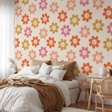 "Daisy Wallpaper by Wall Blush in a cozy bedroom, vibrant floral wall decor focus"