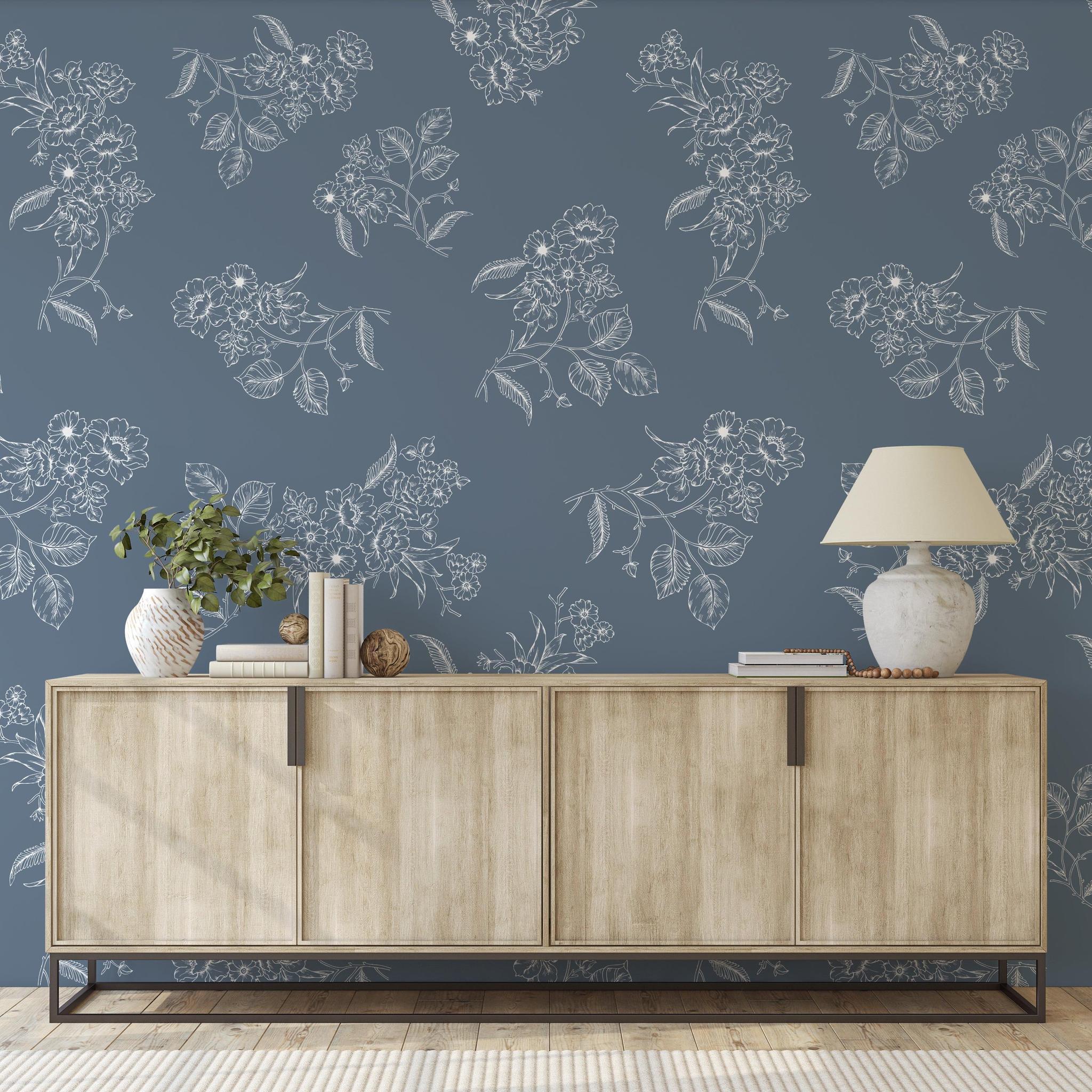 Elegant Tiffanys Wallpaper by Wall Blush in a modern living room, highlighting the floral design.
