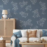 Elegant Tiffany's Wallpaper by Wall Blush adorning living room, enhancing cozy decor with floral design focus.