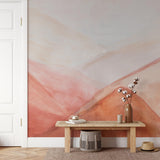 "Wall Blush's Unruly Wallpaper in a modern living room with abstract design accents and warm tones."
