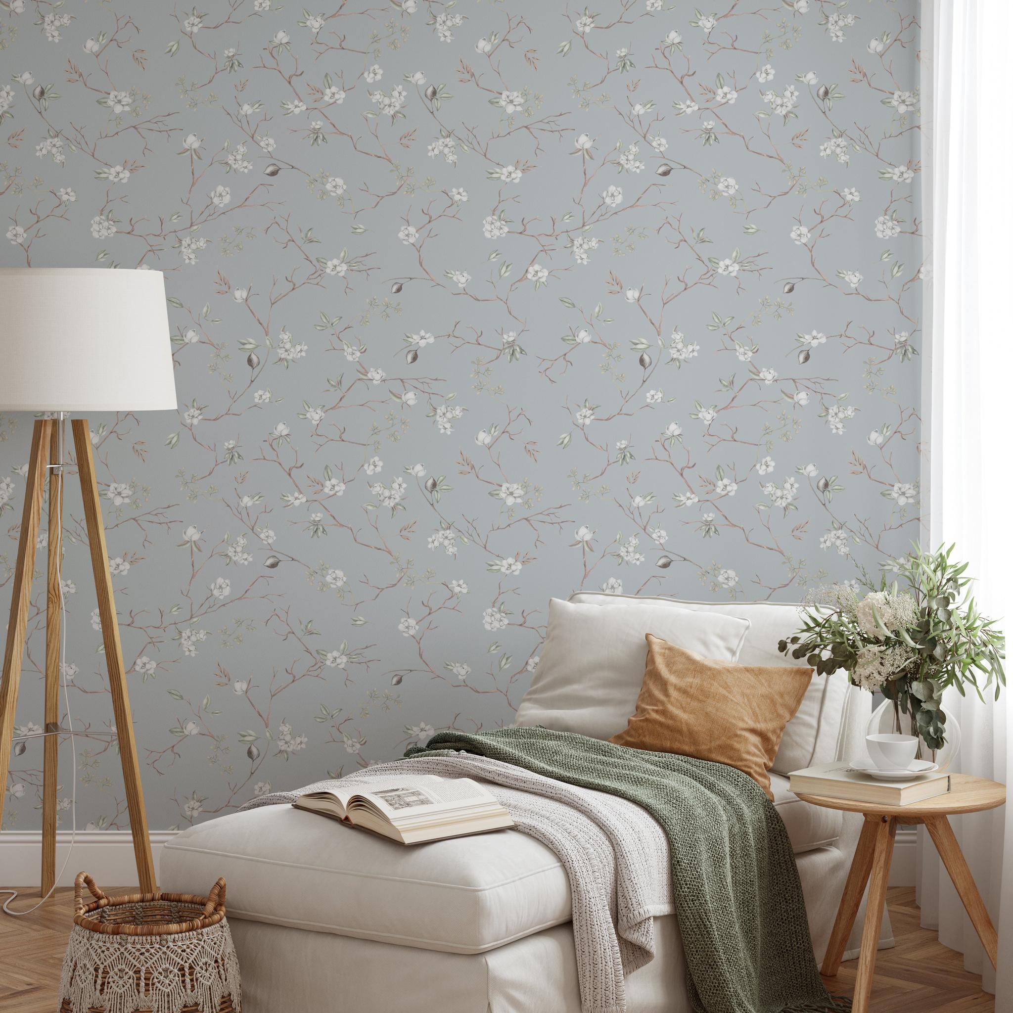"Wall Blush Versailles Wallpaper in cozy bedroom setting with elegant floral design"