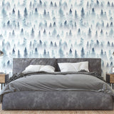 Wanderer Wallpaper by Wall Blush in cozy bedroom setting with forest pattern focus
