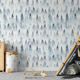 Wanderer Wallpaper by Wall Blush with a forest design in a stylish kids' room, highlighting cozy decor accents.
