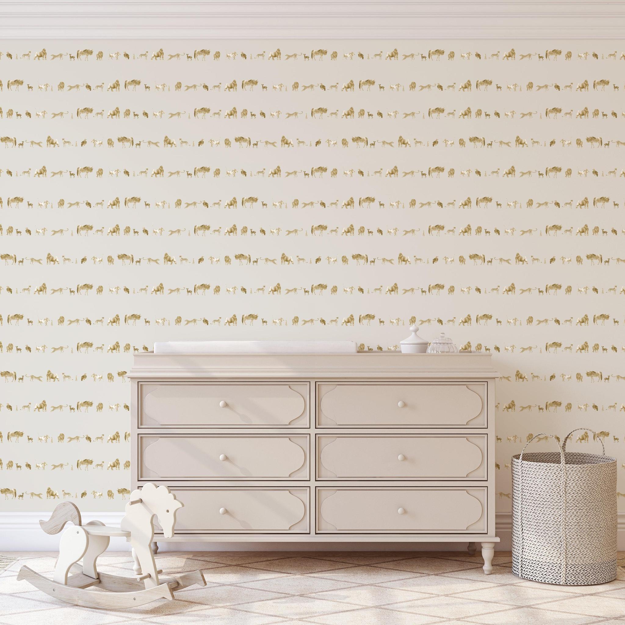 Wall Blush's Wild Child Wallpaper featured in a stylish nursery room highlighting animal motifs, accentuating a modern decor.
