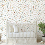 Wall Blush SG02 Wildflower Wallpaper in a serene nursery, showcasing the elegant floral design on the wall.
