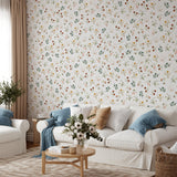 "Wildflower Wallpaper by Wall Blush featured in cozy living room with elegant decor and soft furnishings."