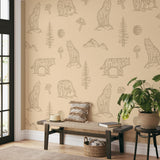 "Into the Forest Wallpaper by Wall Blush in a cozy living room, highlighting the detailed animal prints."