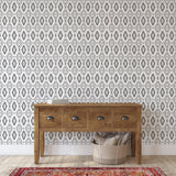 Wall Blush's YEEHAWT (Dark) Wallpaper featured in elegant living room setting, with rustic wood console table.