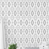 Stylish YEEHAWT (Light) Wallpaper by The MB Line installed in a modern bathroom focus on wall decor.
